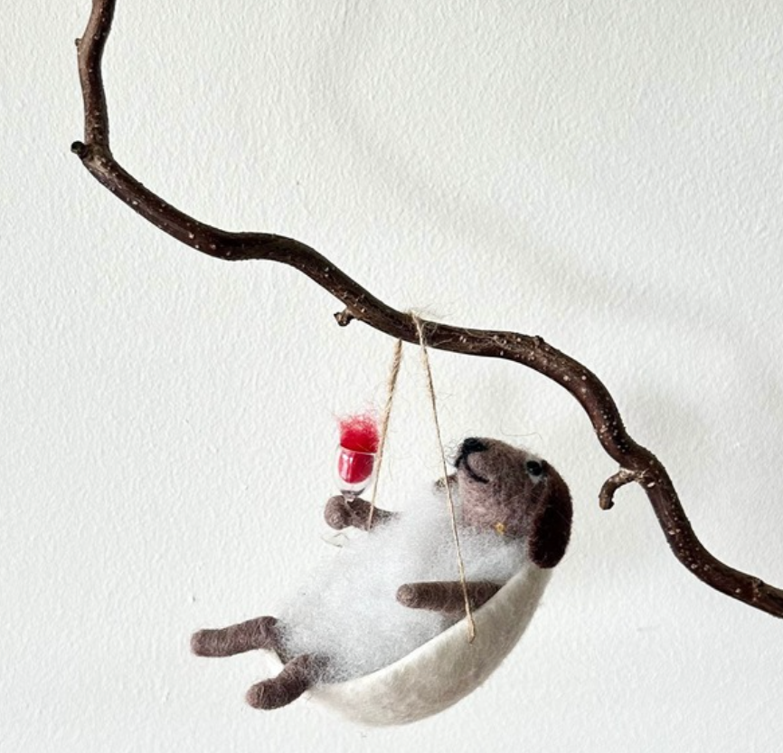 Ullfigur Nummis TV-hund